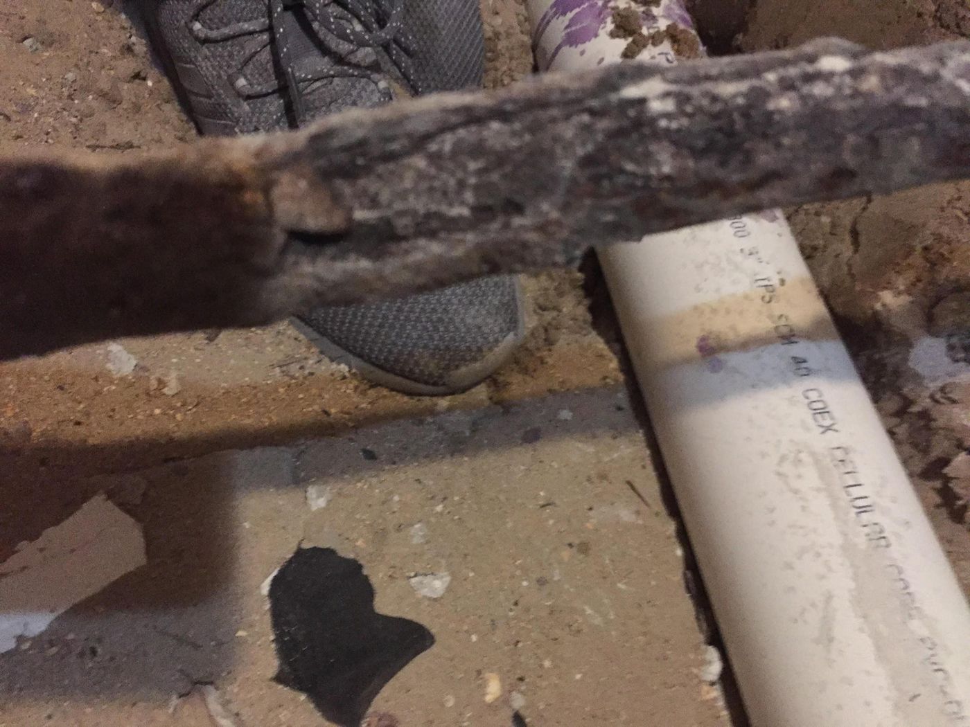Deteriorated pipe below room 5