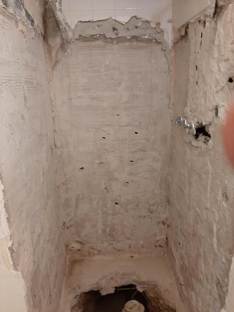Chiseling out an old shower